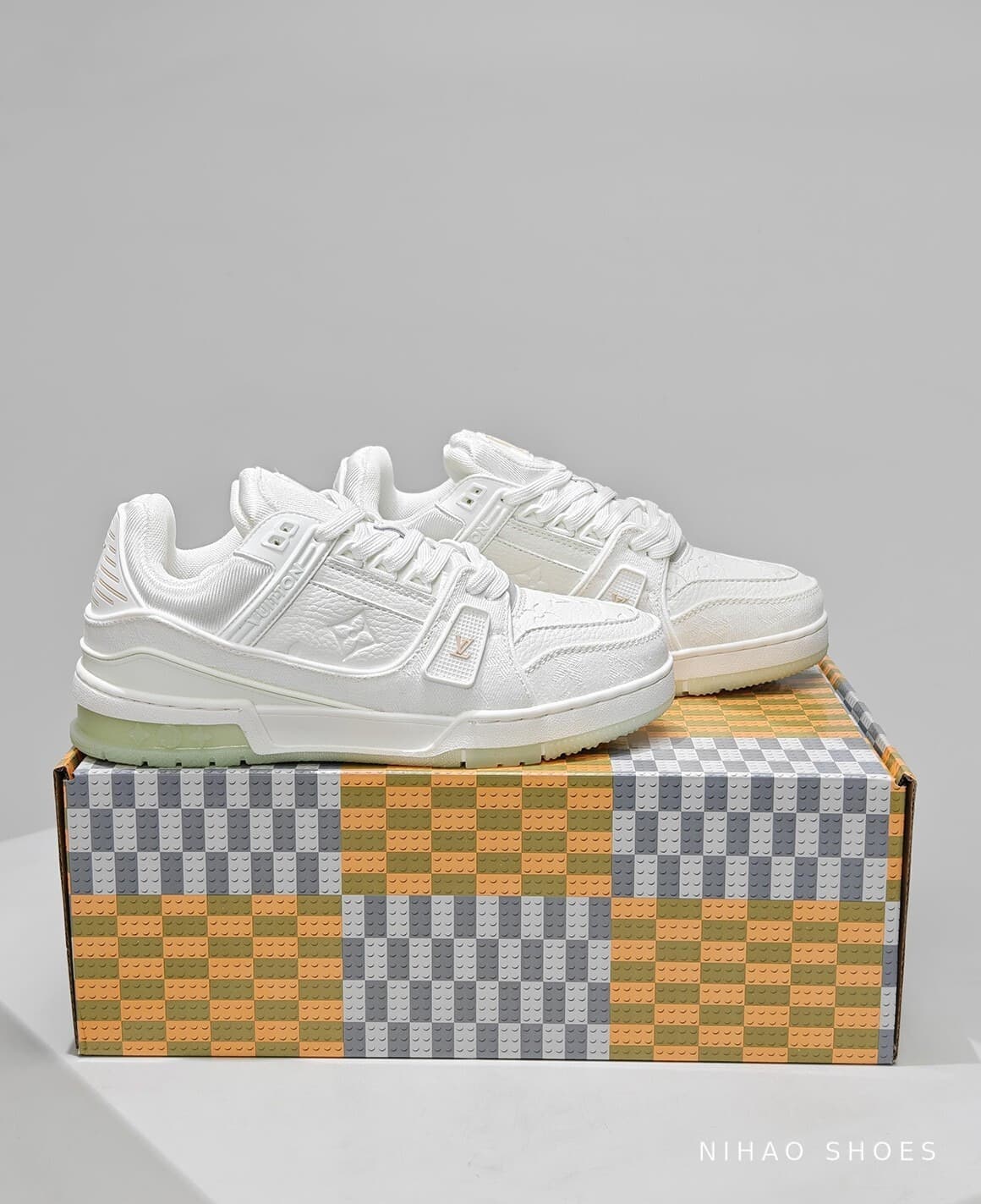 LV Trainer Triple White — pair on the box