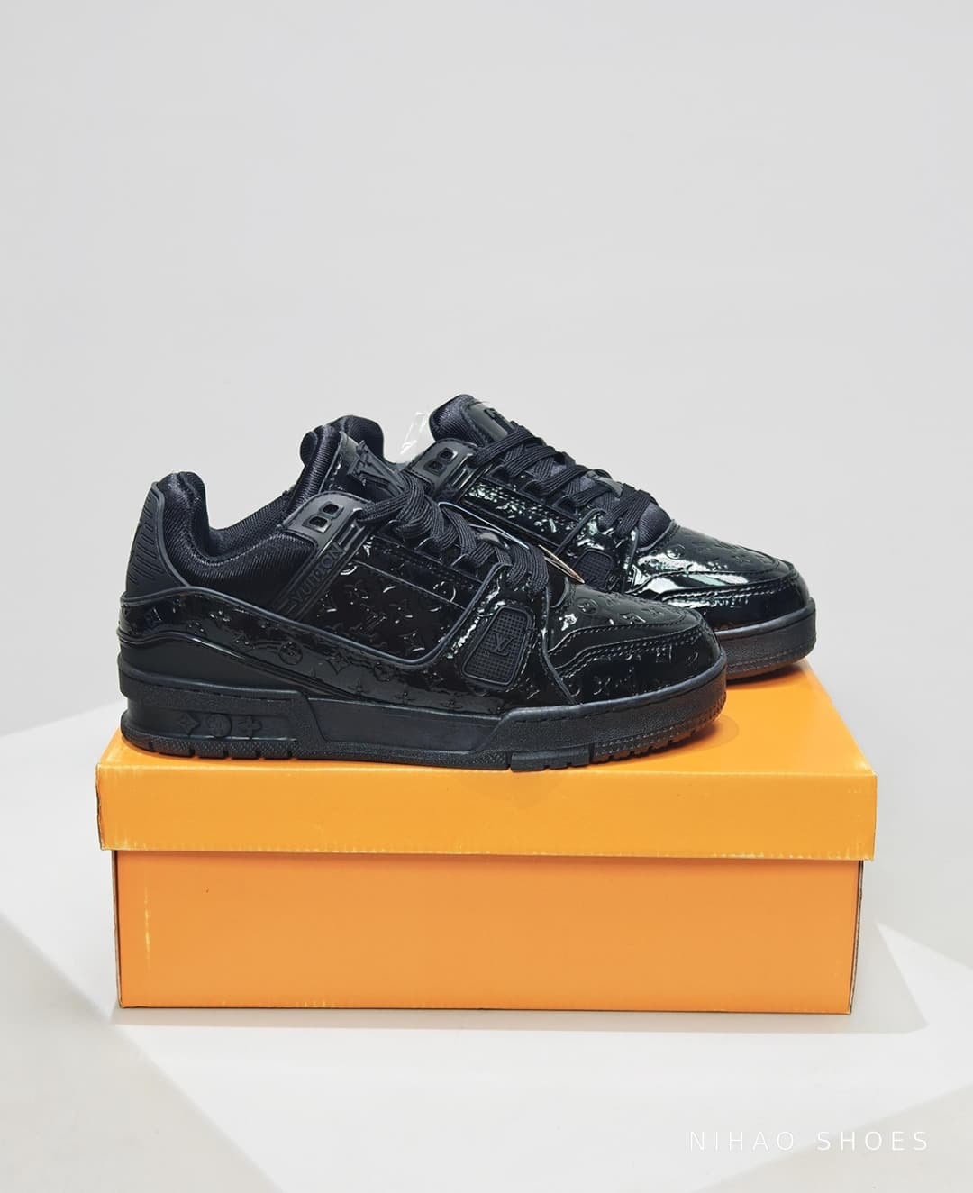 LV Trainer Low Black — pair on the box
